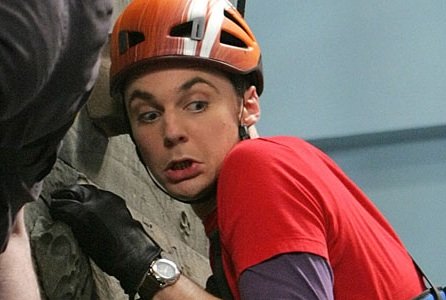 Sheldon, wearing gloves, knows that indoor rock walls can be dirty. Is he being too hygienic?