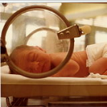 Baby at a Neonatal Intensive Care Unit. Source: Wikipedia